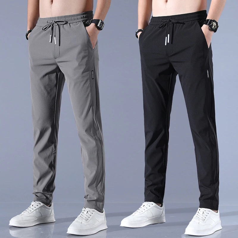 Quần dài thể thao nam ống suông nhẹ chất poly co giãn